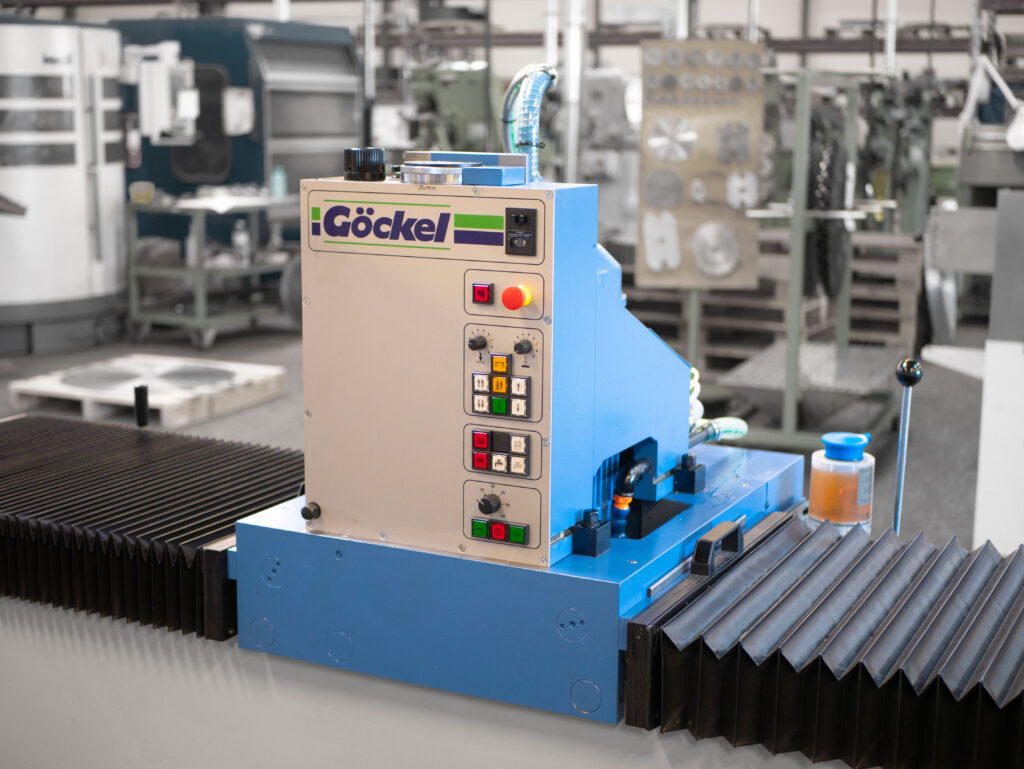 Göckel machine for industrial blade sharpening, photographed in a production workshop.