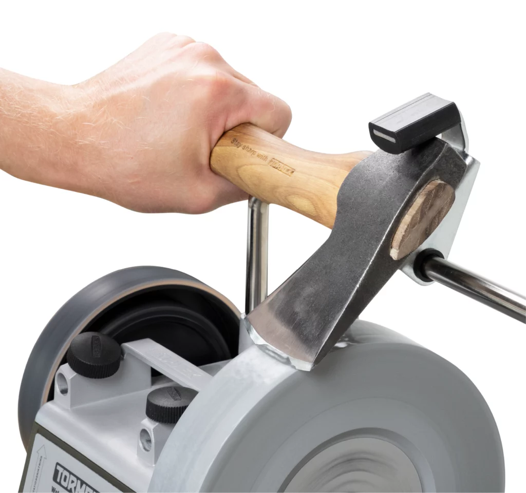 Hand sharpening an axe with a Tormek sharpener for a perfectly sharp and safe blade.